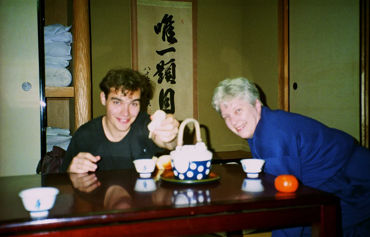 Mom and I offering you a mikan