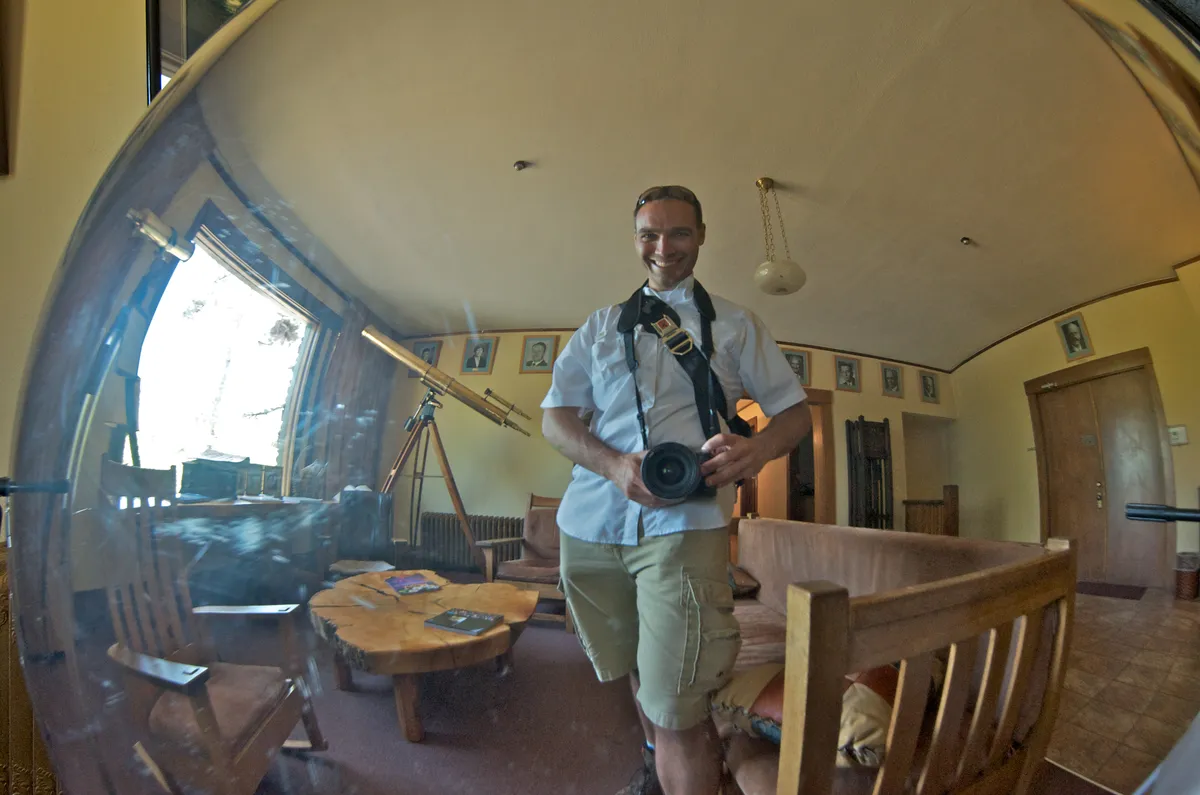 Behind me to the left (my right) is the telescope carried across the country and used to survey sites by William Henry P