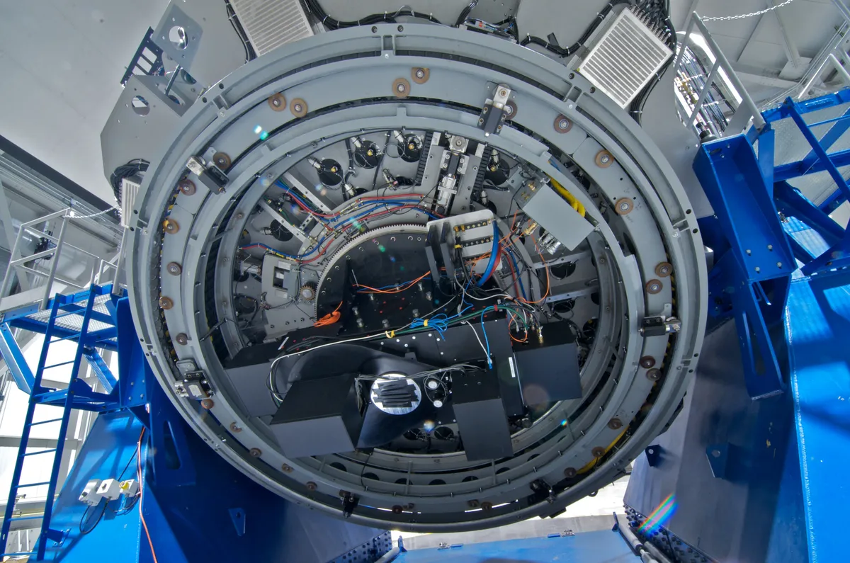View of the back (or bottom) of the telescope with a portion of the LMI (large monolithic instrument) attached