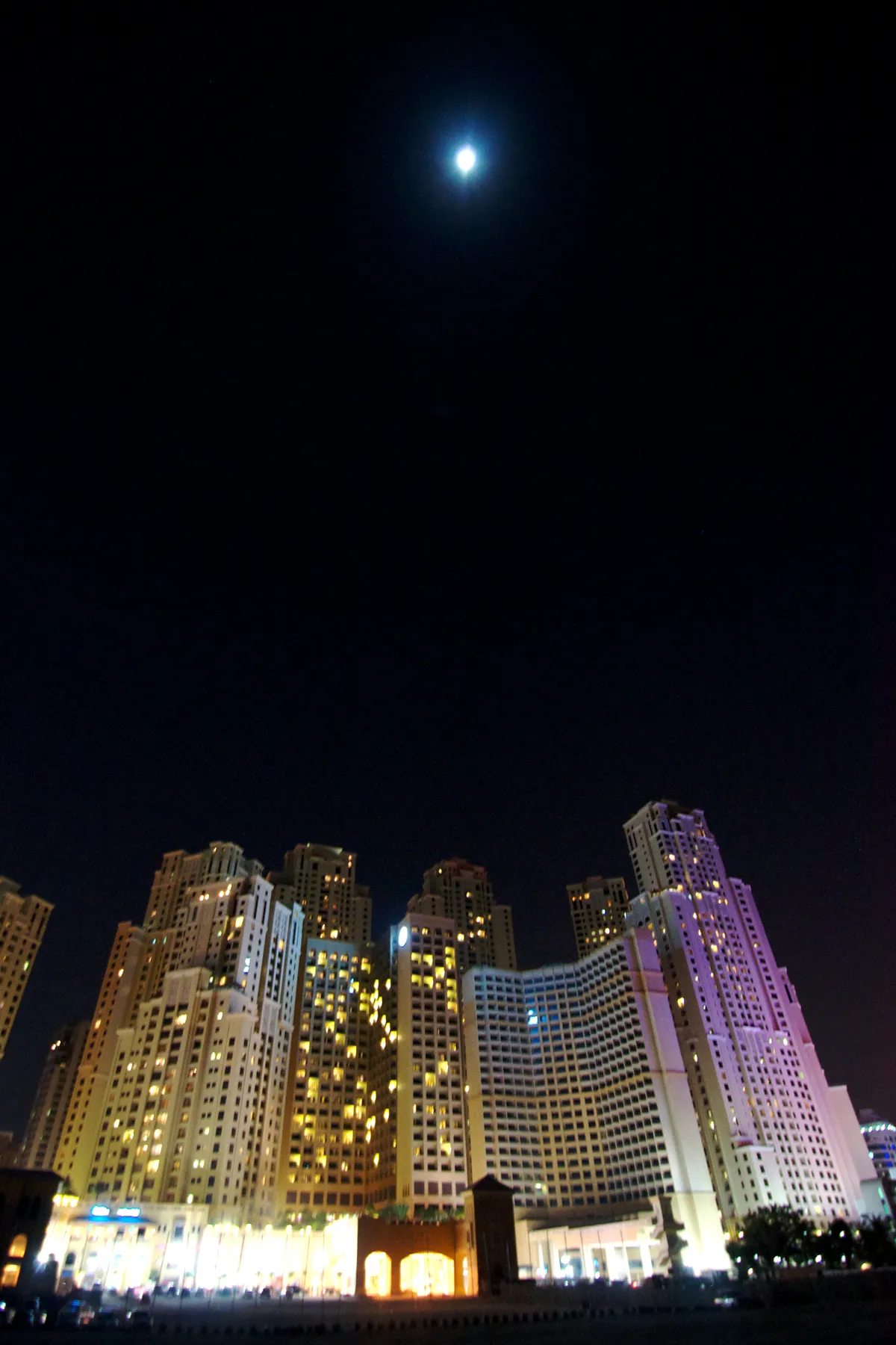 View of Moon over Marina area of Dubai