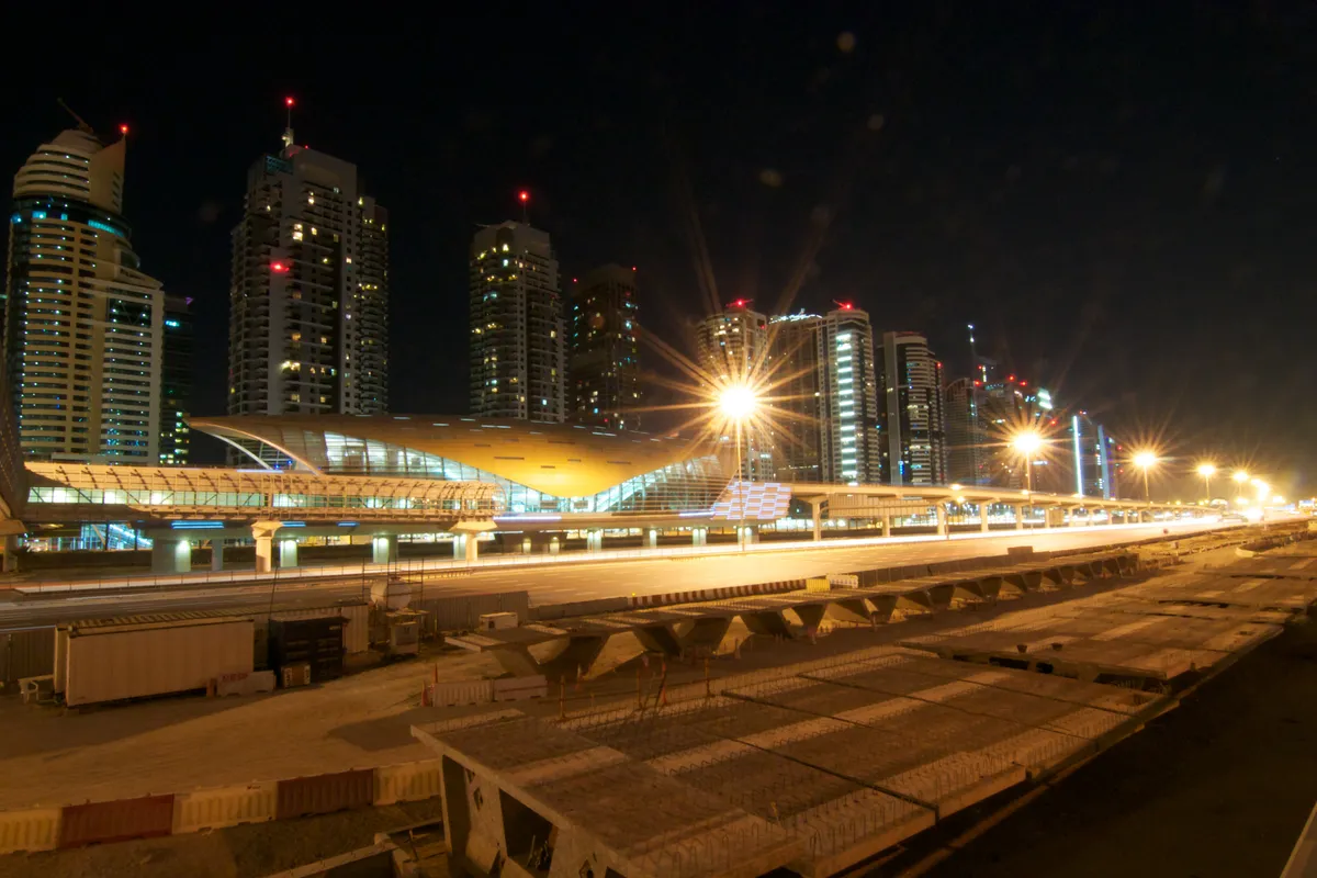 Dubai's new metro system (some 72 kilometers completed in six years) running along the main highway in the Marina area